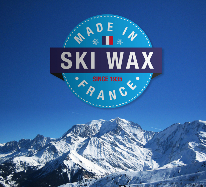 Logo "Made in France Ski Wax" vor verschneiter Berglandschaft unter blauem Himmel.