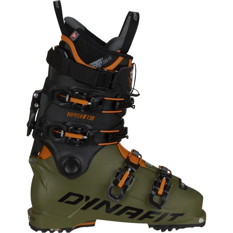 An olive green Dynafit Tigard touring ski boot from the side with black and orange details.