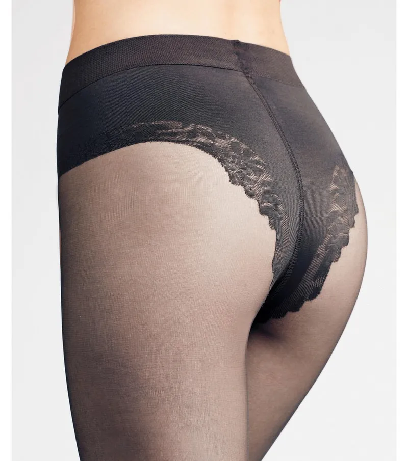 Close-up: Black women's tights (20 DEN) with shaping effect in the hip area.