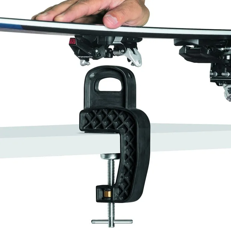 Toko Express BC Ski Vise holds a ski with tech binding on a table top.