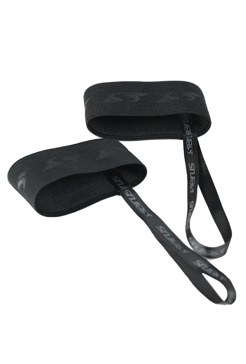 Two black Comfort Leash glove leashes, consisting of an elastic band with logo and loop, insulated on white.