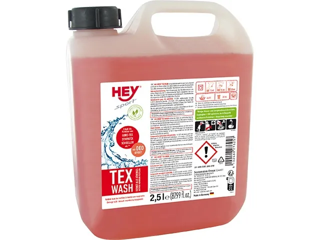 Flacone da 2500 ml di Tex Wash, detergente speciale per indumenti funzionali, di colore rosa con tappo nero.