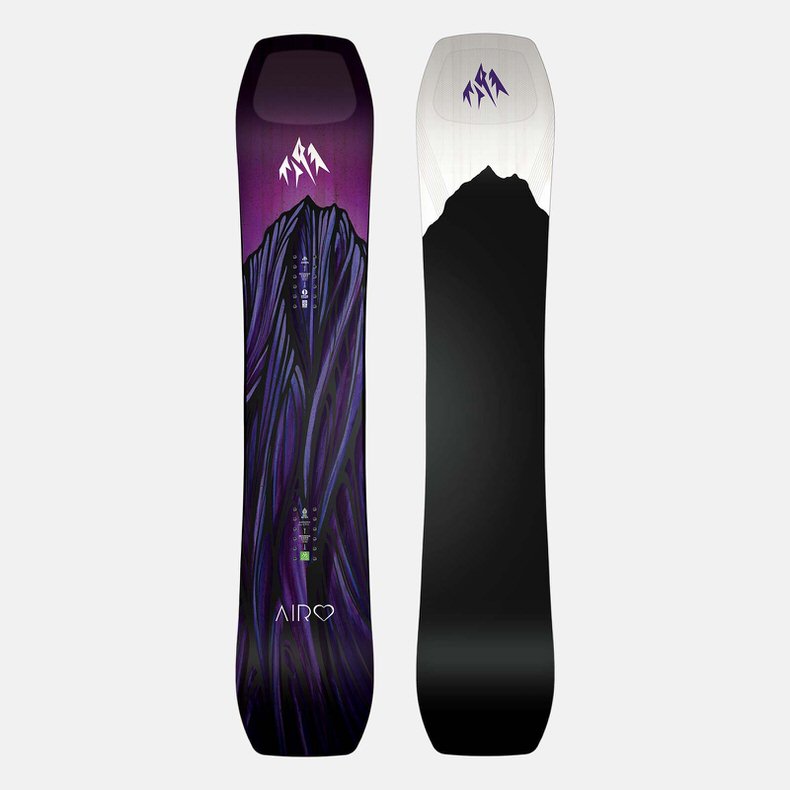 Two Jones Airheart 2.0 snowboards side by side: one purple with a mountain motif, one black and white with a minimalist mountain motif.