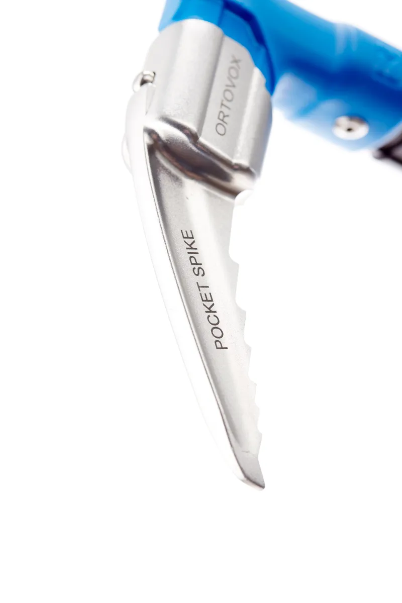 Close-up of a Ortovox PRO ALU III Pocket Spike attachment, silver-colored with blue shaft.