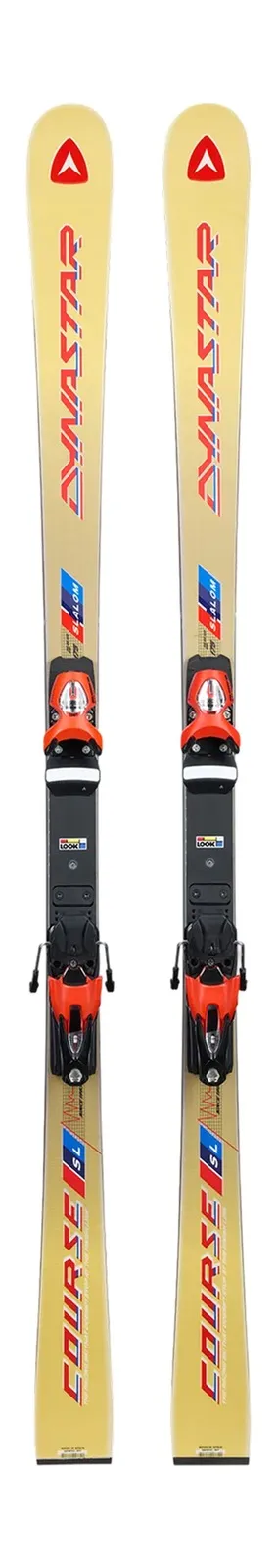 Two yellow Dynastar skis stand upright with red and blue lettering, mounted bindings and red holder.
