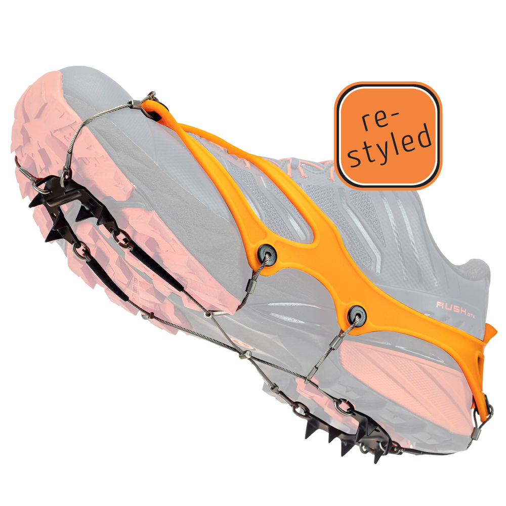 Griffe de chaussure TRAIL 2.1 sur la chaussure de course avec bande élastomère orange et pointes en acier pour la glace, la boue et les surfaces glissantes.