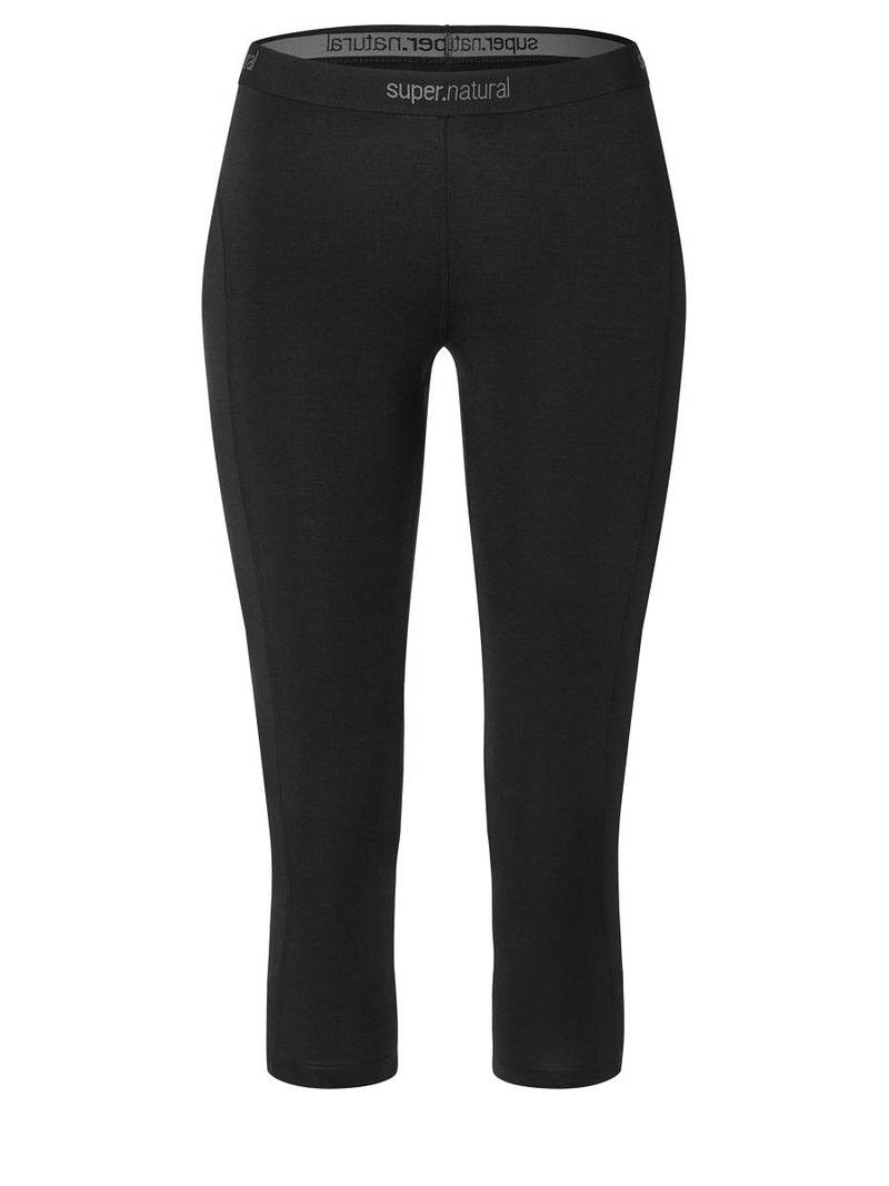 Schwarze 3/4 lange Super.Natural Base Tight für Damen, mit sichtbarem Markennamen am Bund.