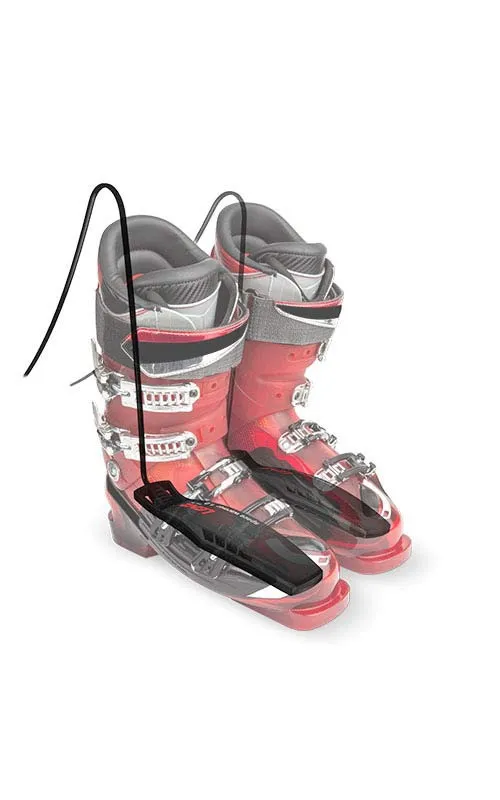 Ski boots with inserted Lenz Space Warmer 1.0, a dryer with heating ribs and cable.