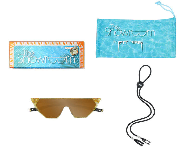 Photo produit : The Showroom Pyrite Lunettes de soleil avec bandeau, étui et emballage.