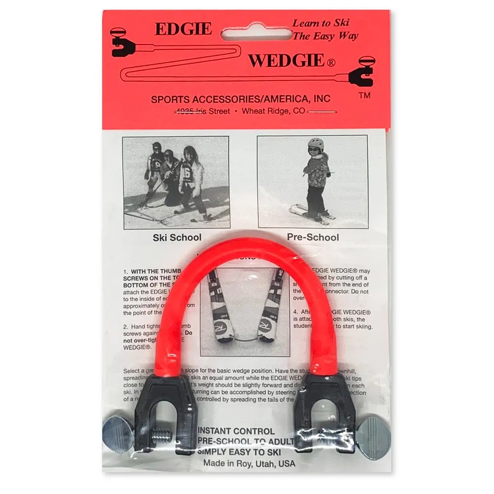 Packaging of the Edgie Wedgie Original Red, an educational ski aid for children. Rubber band with screw clamps.