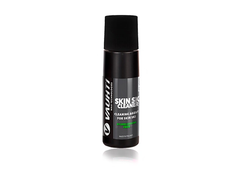 Schwarze Flasche Vauhti Skin Ski Cleaner mit weißer Schrift. Reiniger für Ski mit Fellstreifen.