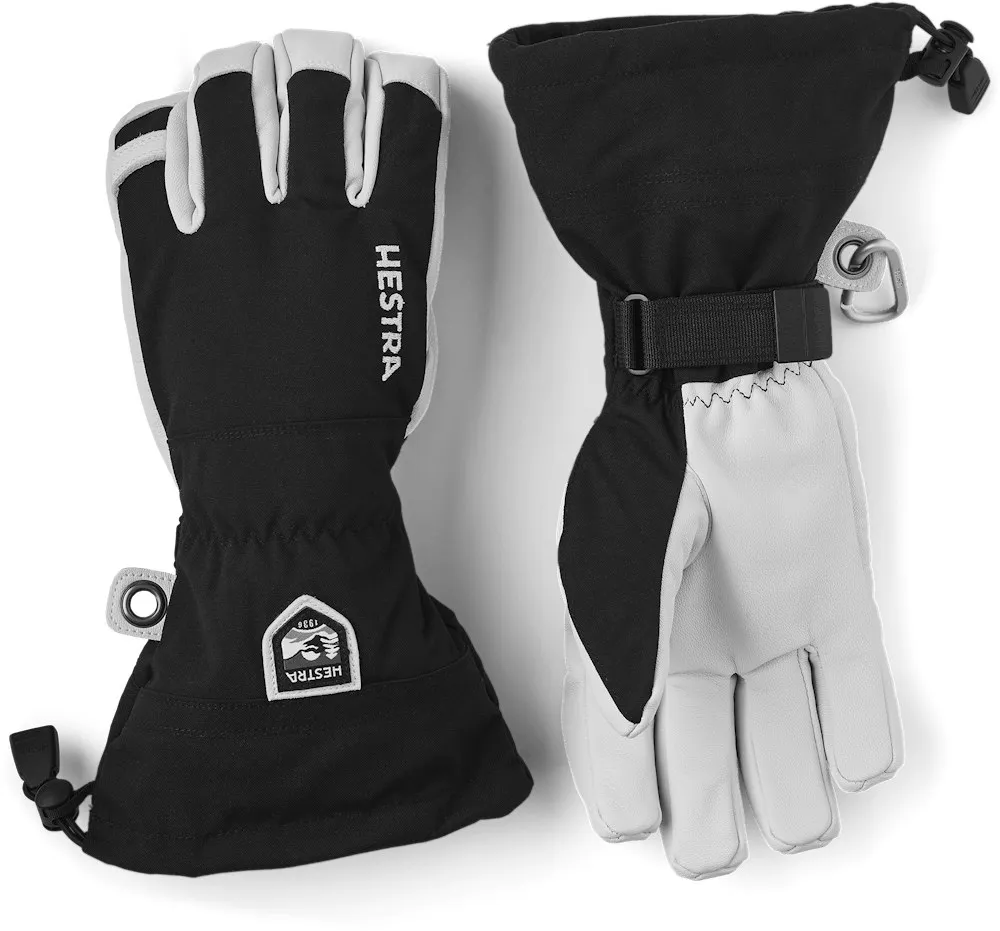 Zwei Hestra Army Leather Heli Ski Mitts, eine mit Handfläche nach oben, die andere nach unten.