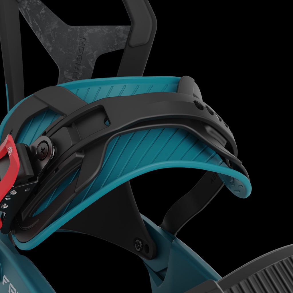 Detailed view of the Union Falcor snowboard binding in teal with black accents.