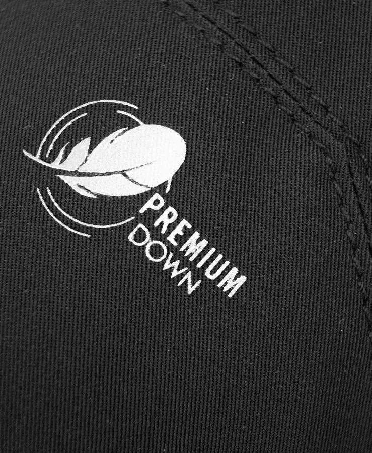 Close-up: "Premium Down" logo with stylized feather on black Reusch Volcano Pro GTX Mitten material.