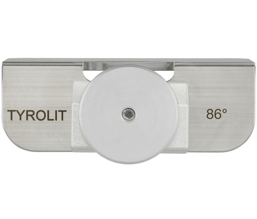 Metallwinkel mit runder, silberner Scheibe in der Mitte. "TYROLIT" links und "86°" rechts auf dem Winkel angezeigt.