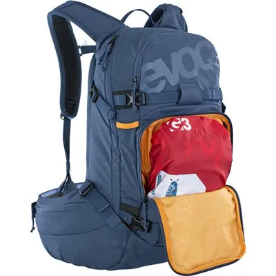 Blue Evoc Line Pro 20L backpack, open compartment with red garment.