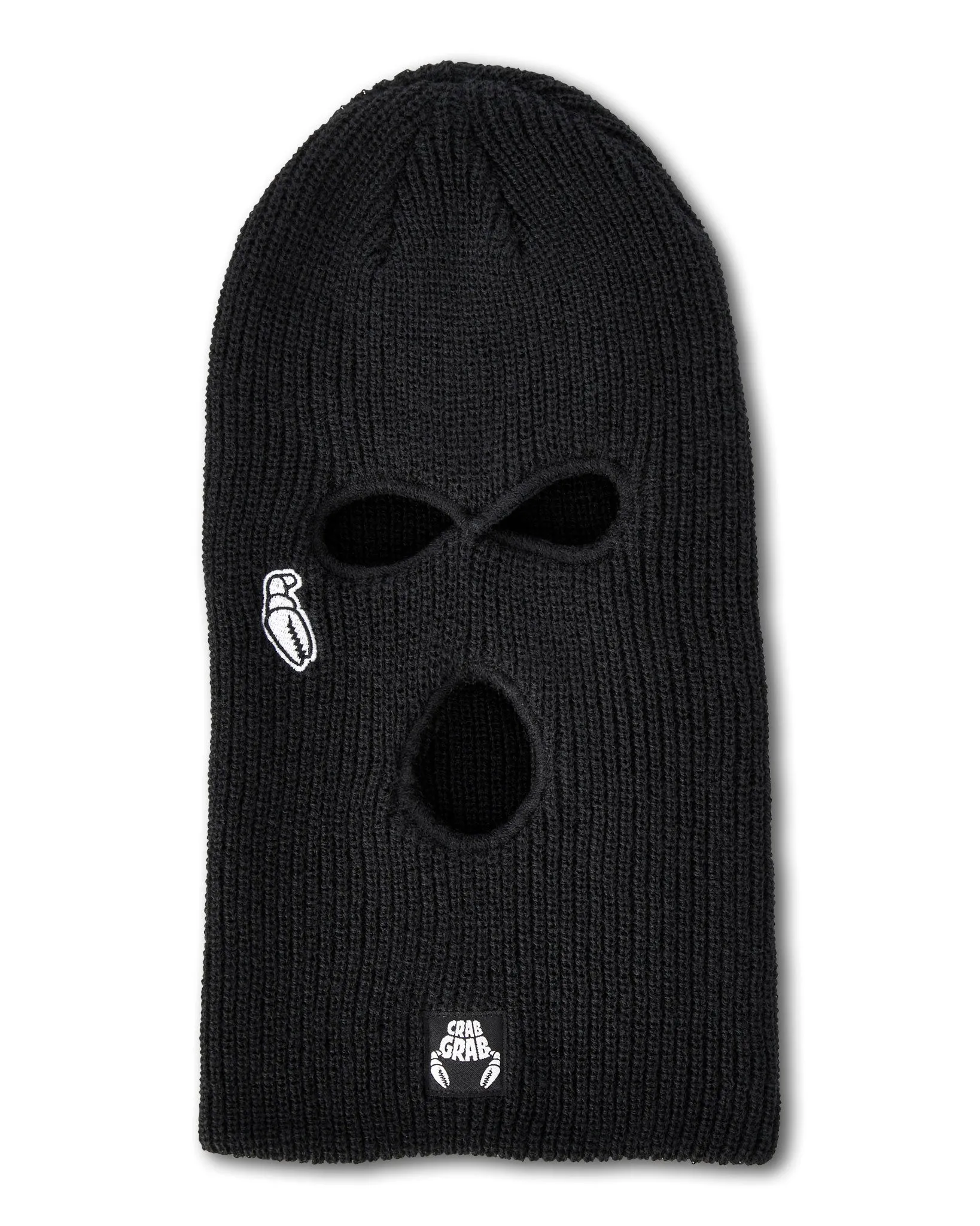 A black, knitted balaclava with three holes for the eyes and mouth. There is a small white design on the left side, and a label on the underside with the text "Crab Grab" and crab designs.
