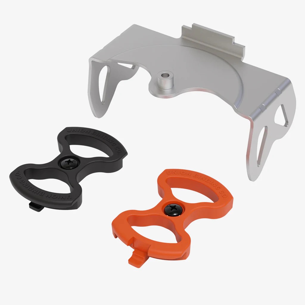 Union Expedition Crampon: silberne Halterung und Griffe in Orange und Schwarz.