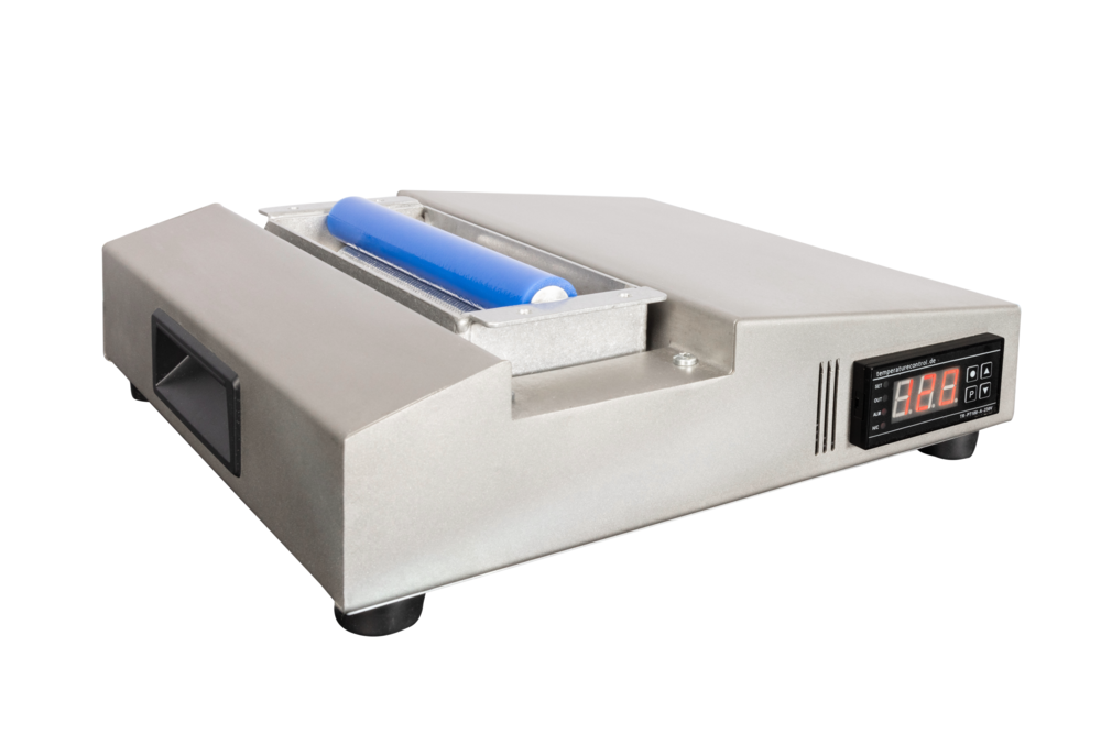 Silver Waxpro 160 appliance Silver Wintersteiger Waxpro 160 digital appliance with blue roller and digital temperature display.