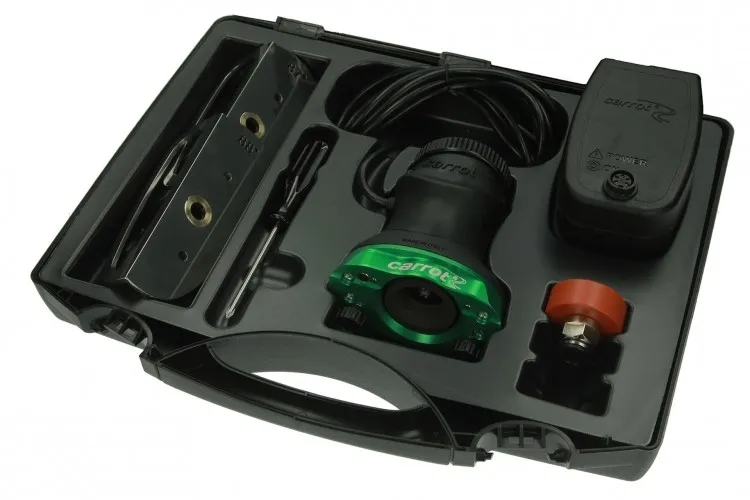 Black carrot machine in a case. Various parts such as mains adapter, grinder and angle included.