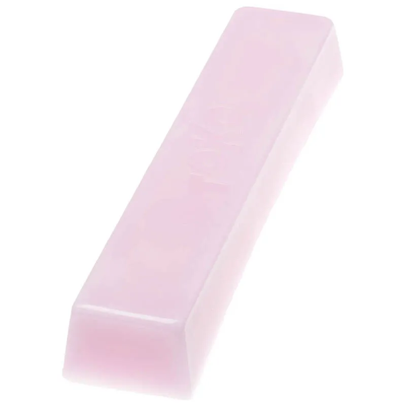 Rechteckiger Block aus rosa Toko Barwax Performance Universal Skiwachs.