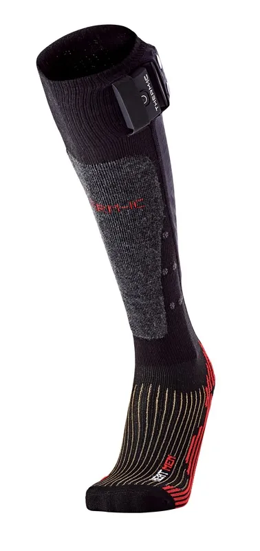 Dunkle Therm-ic Powersock Heat Men V2 mit Batteriefach seitlich und farbigen Verstärkungen am Fuss.