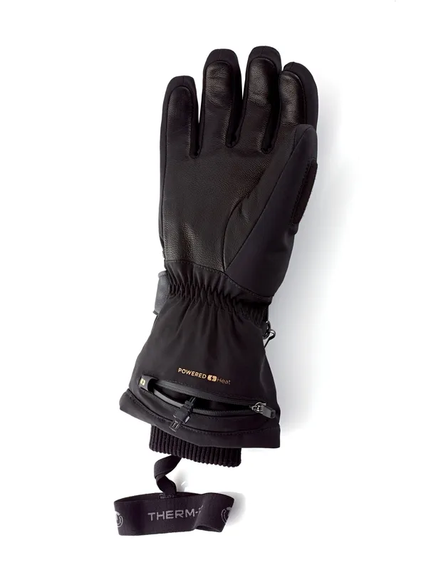 Ein einzelner schwarzer Therm-ic Ultra Heat Glove Women mit offenem Batteriefach und Handgelenkschlaufe.