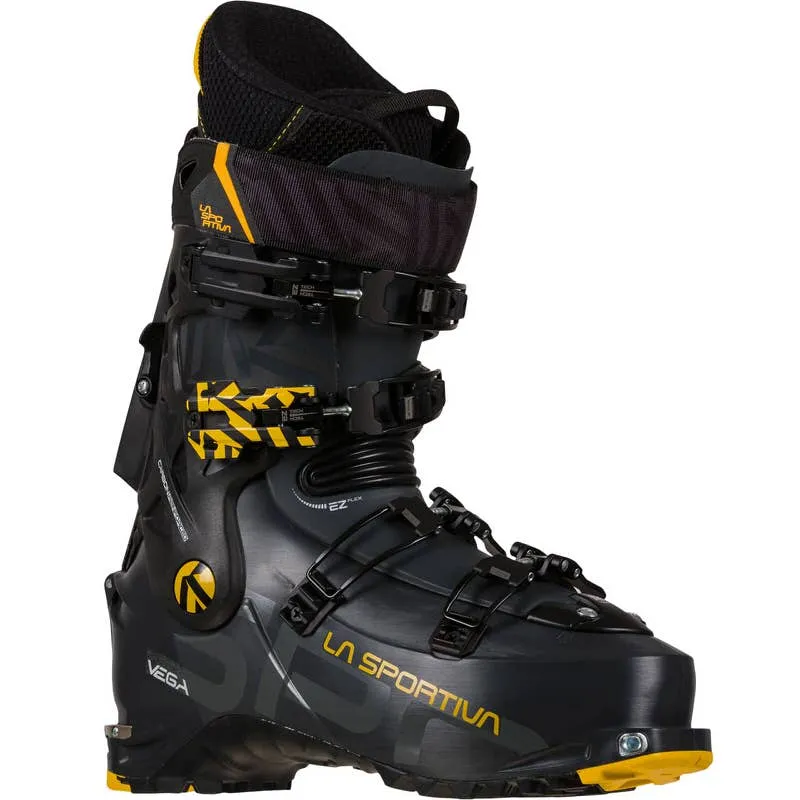 Black La Sportiva Vega Man ski touring boot with yellow accents and four buckles, side view.