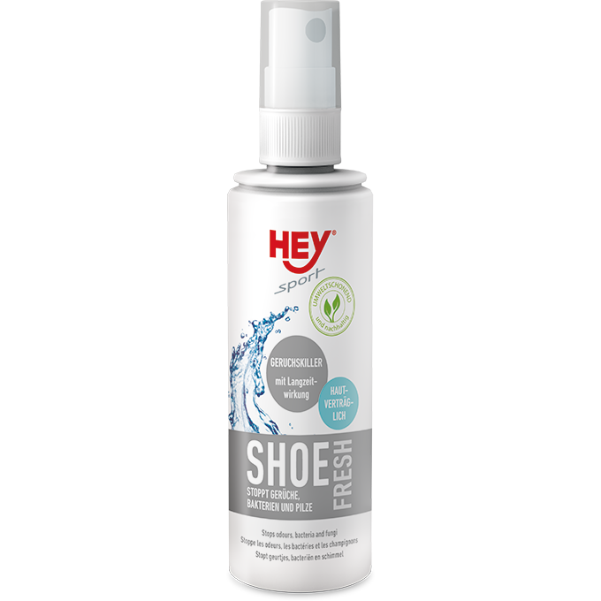Weiße Sprühflasche "HEY Sport Shoe Fresh" mit Texten zu Geruchskontrolle, Bakterien und Pilzbeseitigung. Wasser-Symbol.