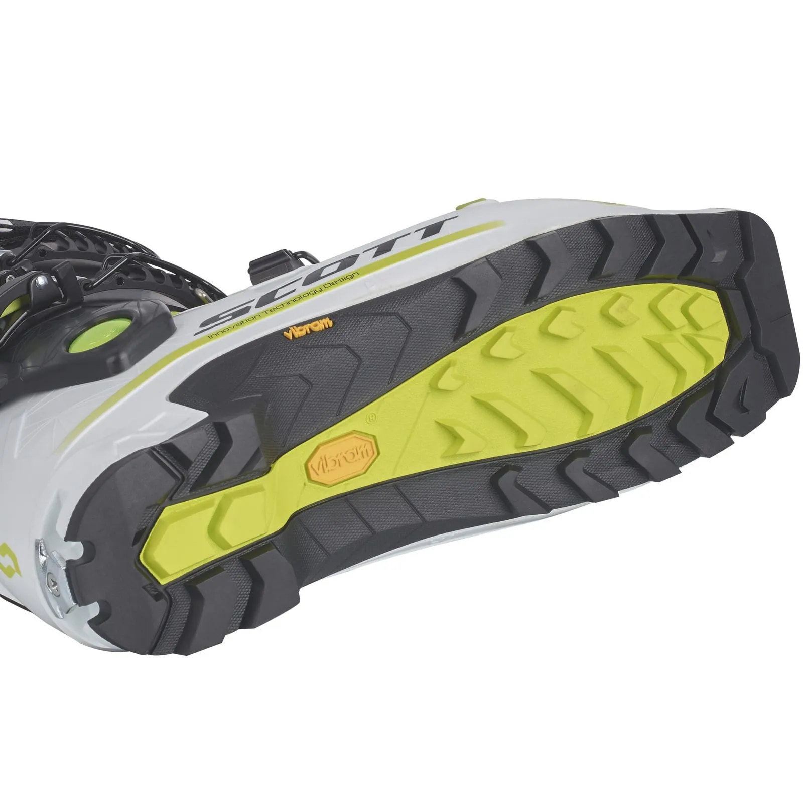 Nahaufnahme der Sohle vom Scott Cosmos Tour Skitourenschuh in Grau, Schwarz und Gelbgrün mit Vibram Logo.