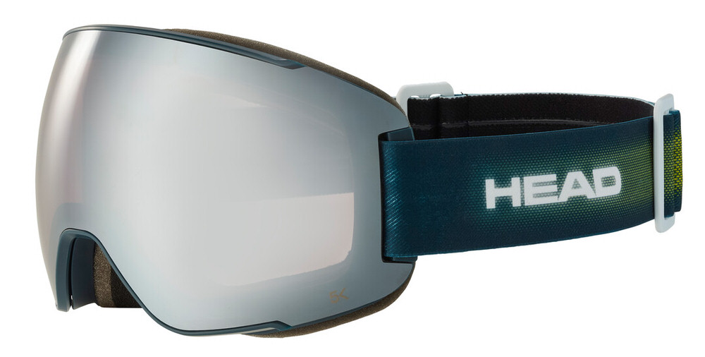 Chromfarbene Head Magnify 5K Skibrille mit blau-grünem Band und "HEAD"-Logo, seitliche Ansicht.