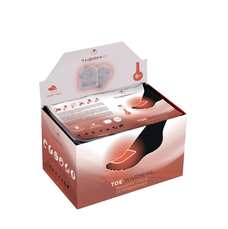 Toe Warmers Heizpads Offene Box mit Toe Warmers Heizpads, Packung mit Zehenwärmer mit Anwendungsbeispiele auf der Seite.