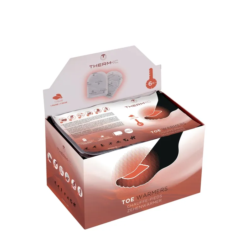 Offene Box mit Toe Warmers Heizpads, Packung mit Zehenwärmer mit Anwendungsbeispiele auf der Seite.