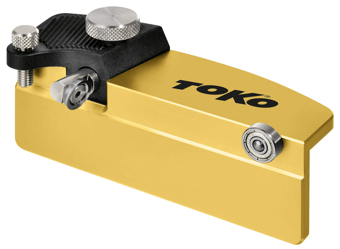 Goldener Toko Sidewall Planer World Cup mit schwarzem Griff und silbernen Einstellrädern für präzisen Kantenservice.