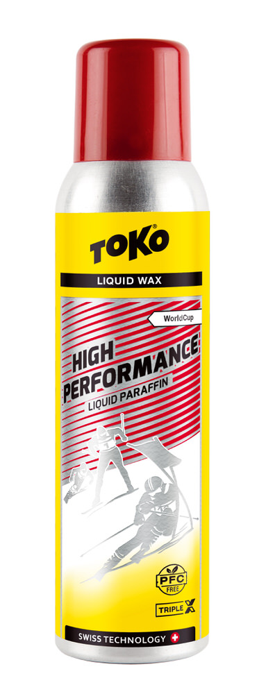 Eine Dose Toko High Performance Liquid Paraffin red TripleX mit rotem Deckel und gelbem Etikett, das Skifahrer zeigt.
