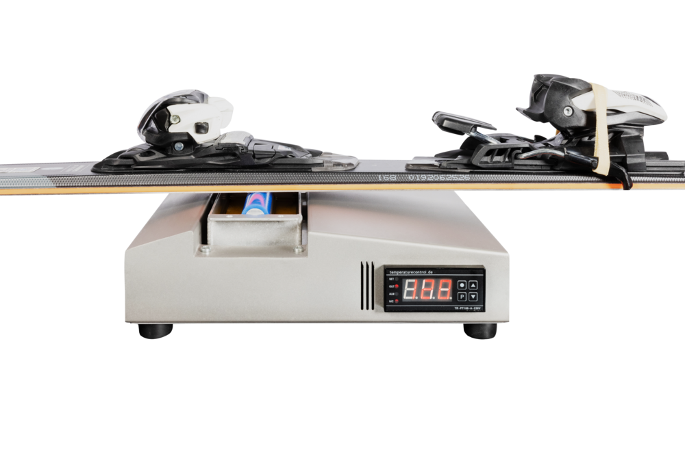 Wintersteiger Waxpro 160 Wintersteiger Waxpro 160 digital device with ski, digital display and wax container.