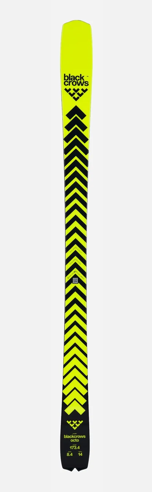 Ski with yellow base and black chevron pattern, Black Crows logo at both ends, product details at the end of the ski.