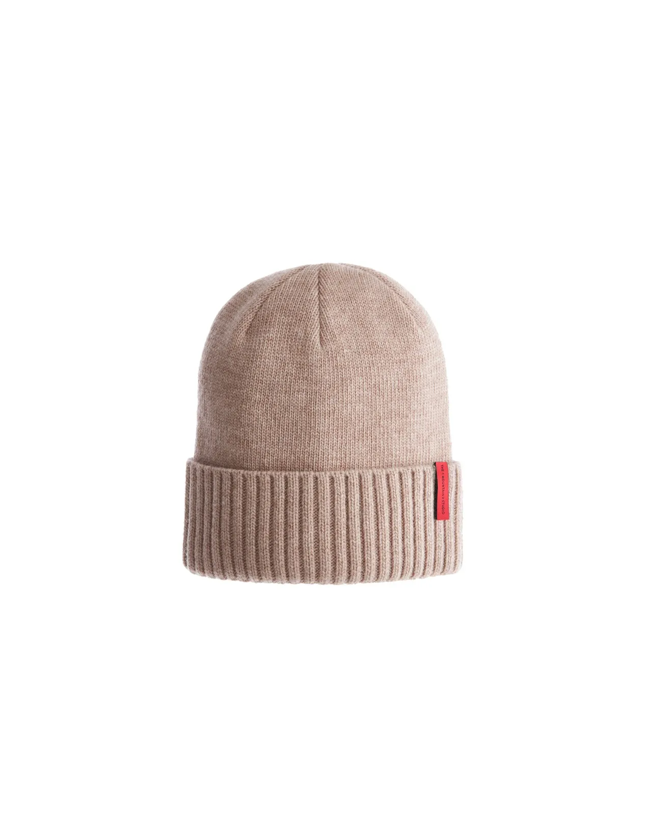 Beige cashmere mix beanie with red label and rib-knit cuff against a neutral background.