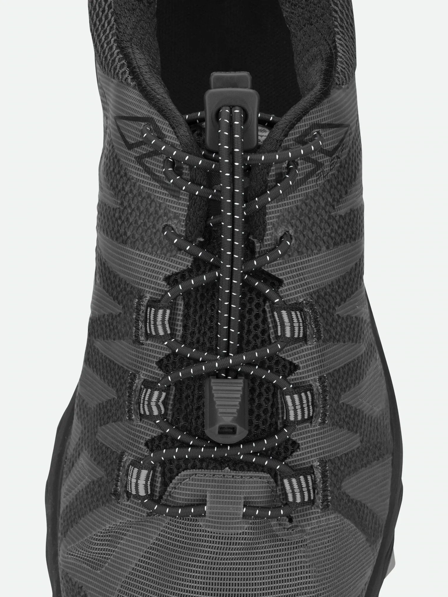 Close-up of a black running shoe with elastic black run laces and white accents.