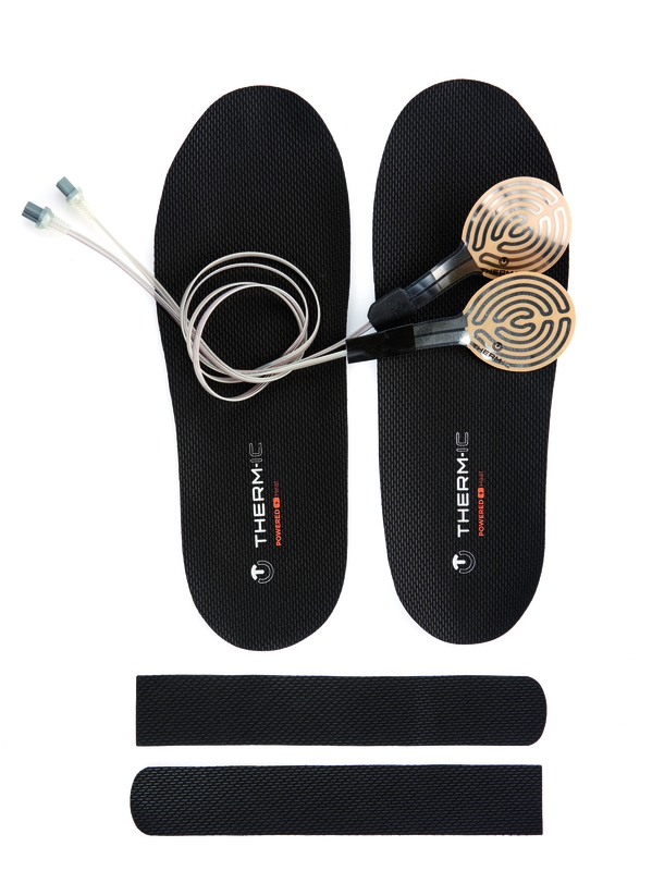 Therm-ic Insole Heat Kit: Zwei Einlegesohlen mit Heizelementen und Zubehör für die Montage.