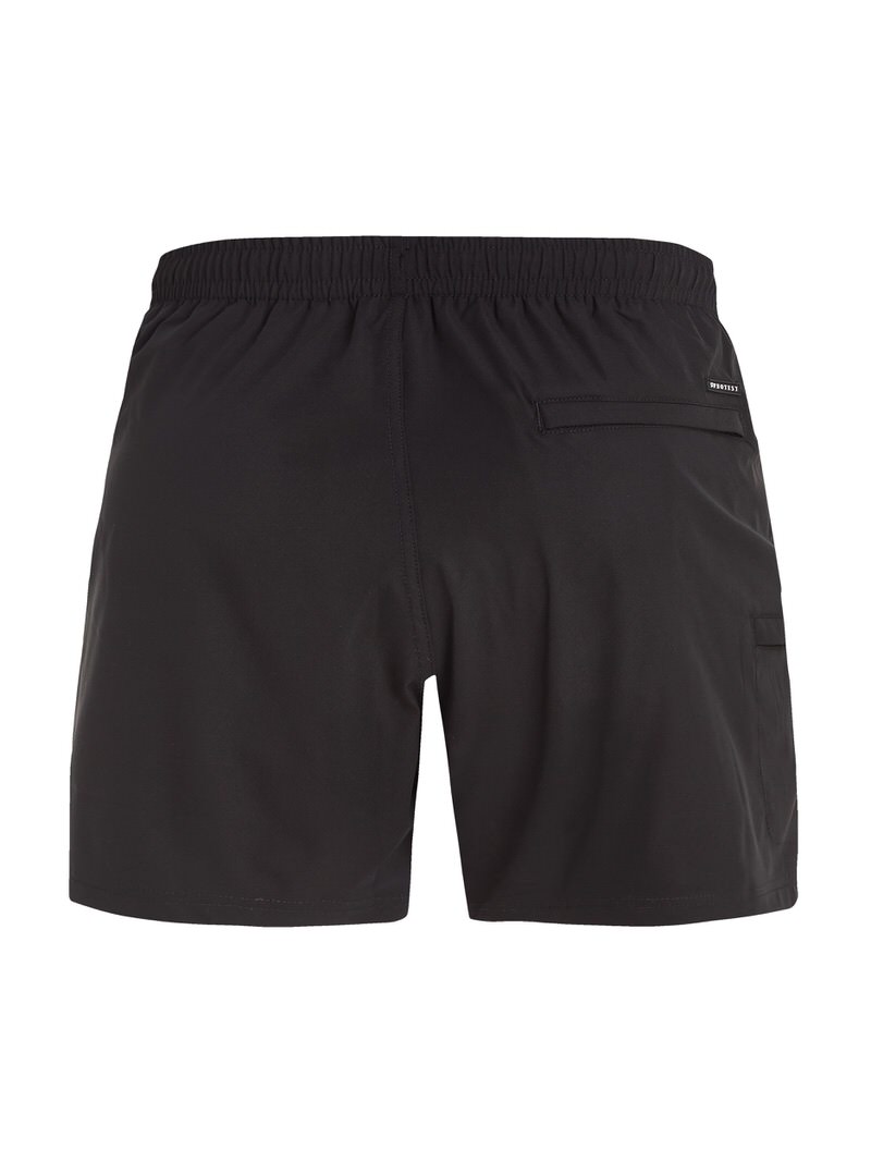 Schwarze PRTYESSINE Badeshorts von Protest, Rückansicht. Elastischer Bund, Gesäßtasche mit kleinem Logo.