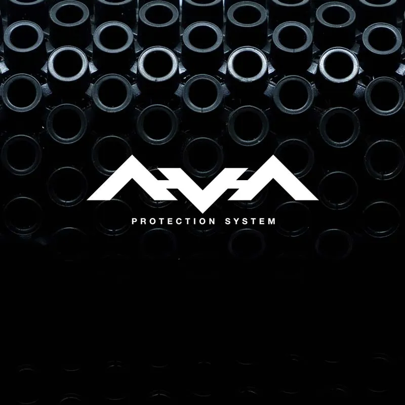 Detail of the AVA protection system of the Behold Junior vest with logo in front of round, black elements.