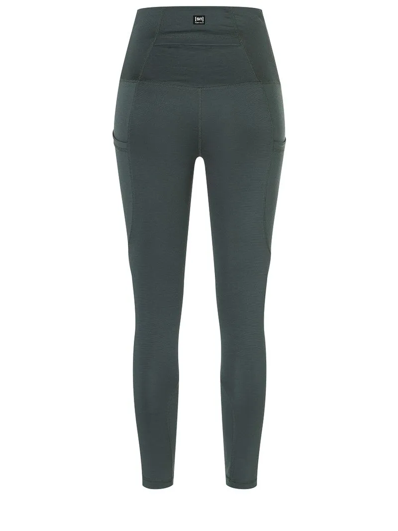 Cuissard de sport vert foncé moulant avec taille haute et poches latérales.