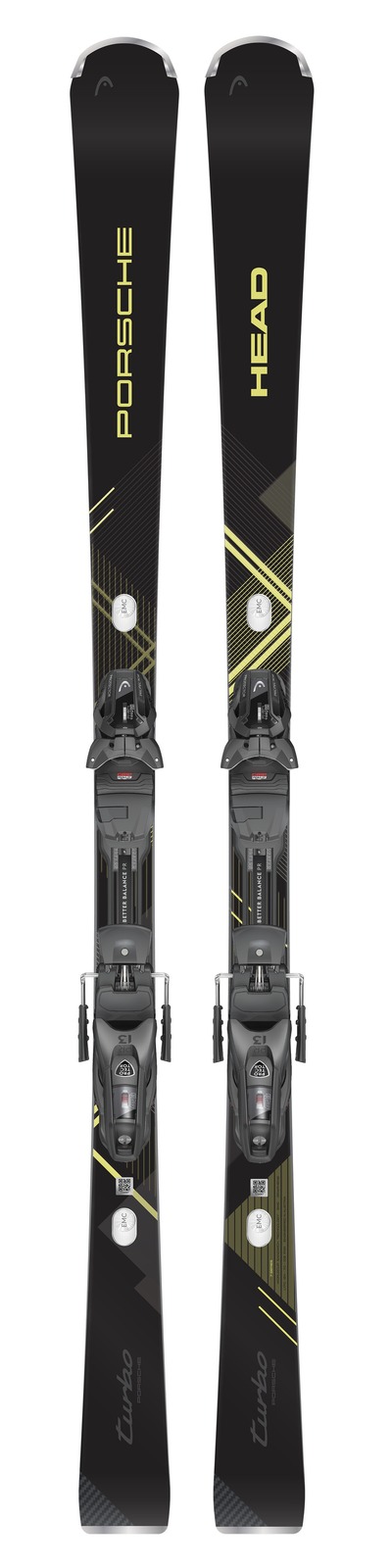 Two black Head Porsche 7 Series skis with yellow lettering and bindings.