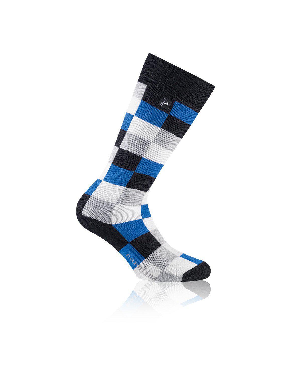 Chaussettes de ski bleu foncé pour enfants Une chaussette bleu foncé Rohner Ski Kids avec un motif à carreaux en bleu, gris et blanc.