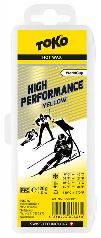 Cera per sci Toko Giallo Confezione della cera da sci Toko High Performance Yellow con illustrazione dello sciatore e informazioni sulla temperatura.