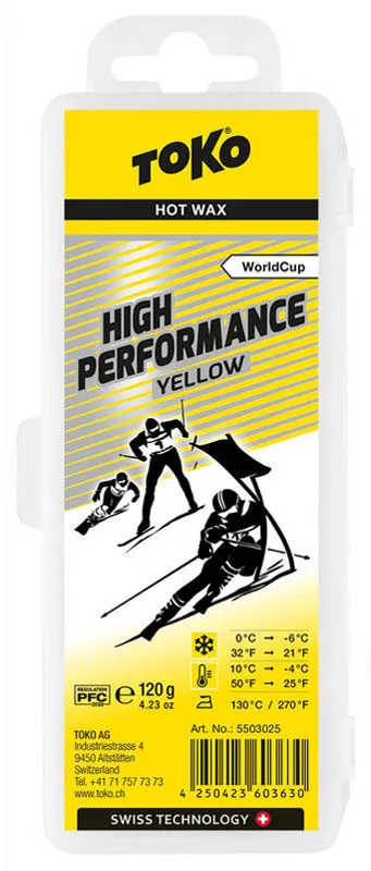 Verpackung Toko High Performance Yellow Skiwachs mit Skifahrern-Illustration und Temperaturangaben.