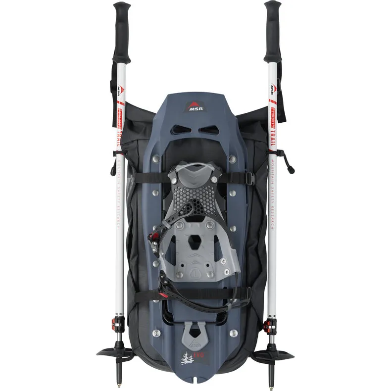 MSR Evo Trail snowshoes and trekking poles attached to a backpack.