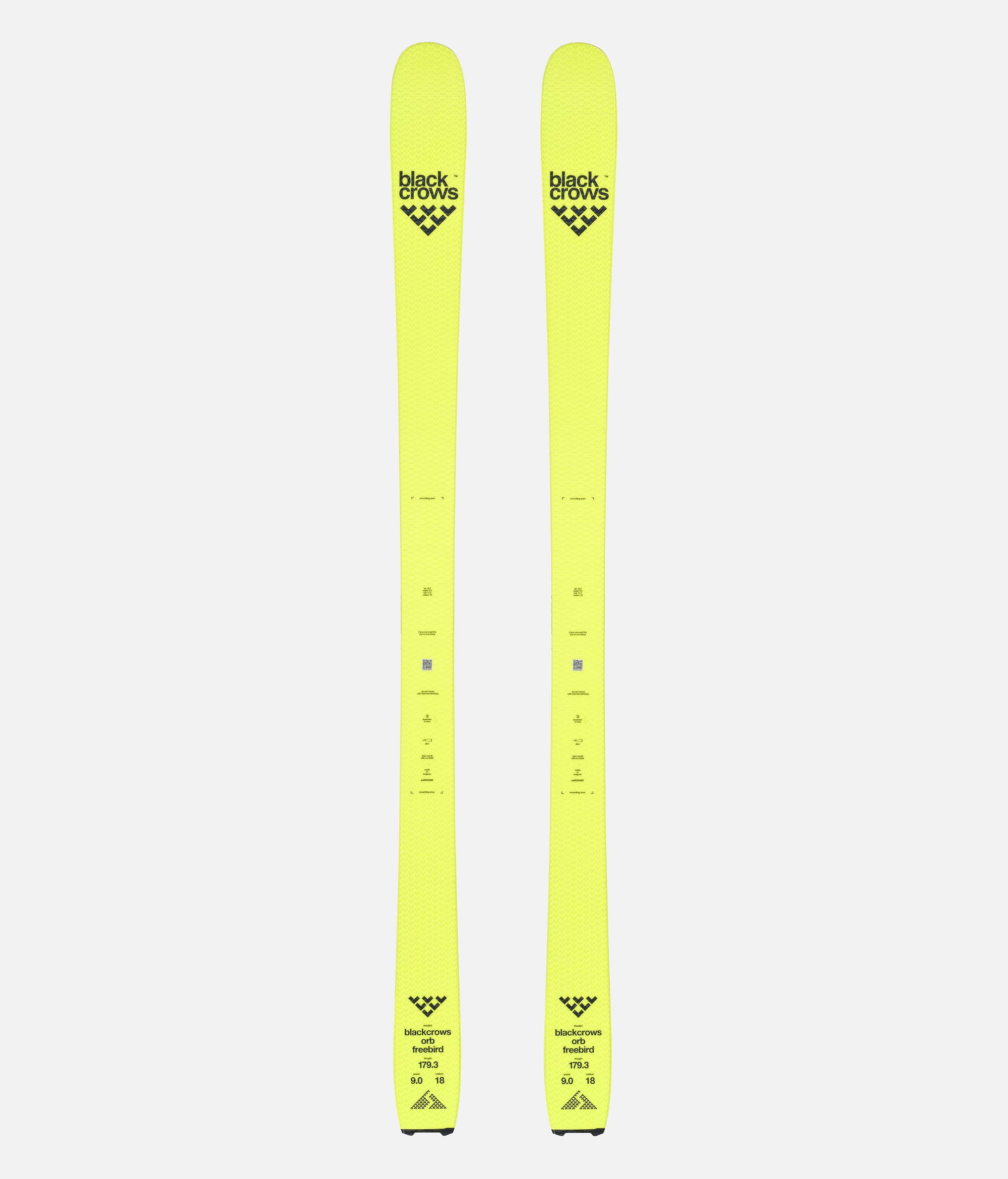 Gelbe Black Crows Orb Freebird Ski, von oben fotografiert, mit Logo und technischen Daten.