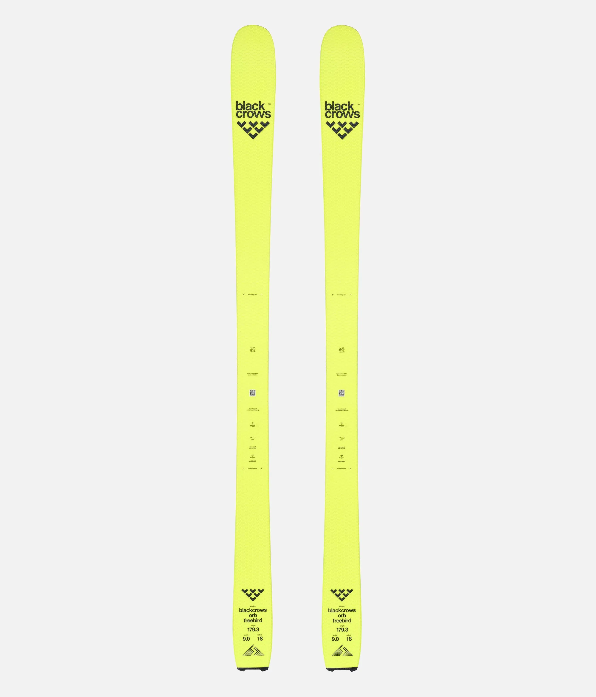 Gelbe Black Crows Orb Freebird Ski, von oben fotografiert, mit Logo und technischen Daten.